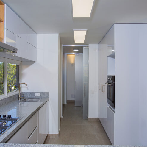 Cocina con mesón en Granito ref. Jaspe gris